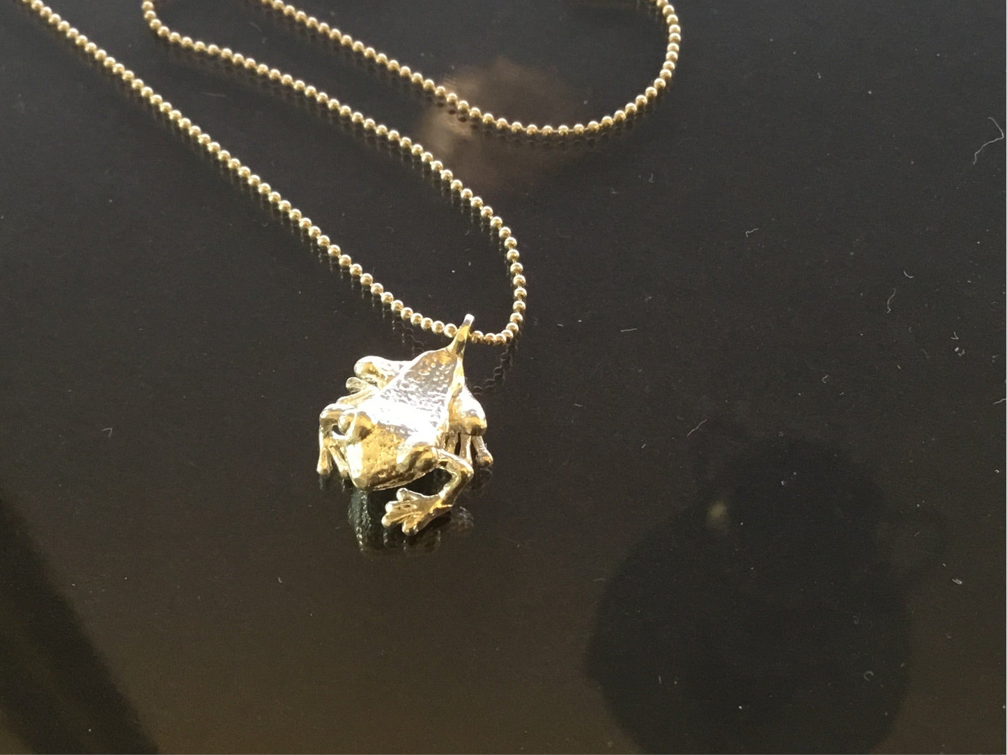 Coqui Dorado 18kt gold